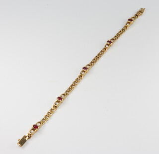 An 18ct yellow gold ruby and diamond bracelet, 14.2 grams gross