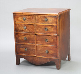 A 19th Century mahogany commode in the form of a 4 drawer chest enclosed by panelled doors 70cm h x 64cm w x 46cm d 