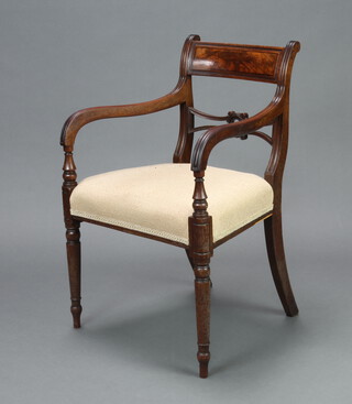 A 19th Century mahogany bar back carver chair with shaped mid rail and overstuffed seat, raised on turned supports 83cm h x 53cm w x 45cm d (seat 35cm x 33cm) 