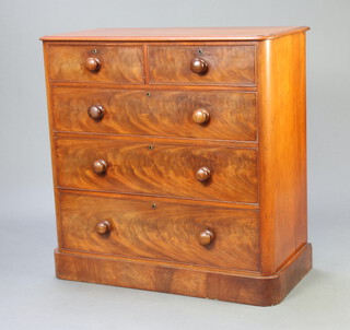 A Victorian mahogany D shaped chest of 2 short and 3 long drawers with tore handles, raised on a platform base 106cm h x 104cm w x 51cm d 