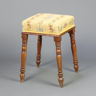 A Victorian square stool with Berlin style woolwork seat, raised on turned supports 53cm h x 34cm w x 34cm d 