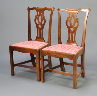 A pair of 19th Century Chippendale style dining chairs with vase shaped slat backs and upholstered drop in seats, raised on square supports with H framed stretcher 96cm h x 54cm w x 49cm (seat 30cm x 26cm) 