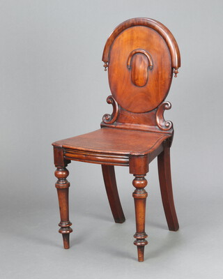 A Victorian shaped mahogany hall chair with solid seat, raised on turned supports 90cm h x 44cm w x 38cm d (seat 20cm x 24cm) 