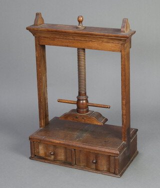 A 17th/18th Century oak book press, the base fitted 2 drawers 73cm h x 48cm w x 29cm d 