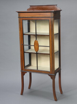 An Edwardian inlaid mahogany display cabinet with raised back, fitted shelves enclosed by astragal glazed panelled doors, raised on outswept supports 135cm h x 58cm w x 30cm d 