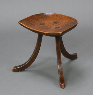 Liberty & Co, a Thebes oak 3 legged stool 36cm h x 34cm w x 26cm d, the base with faded Liberty & Co of London label 