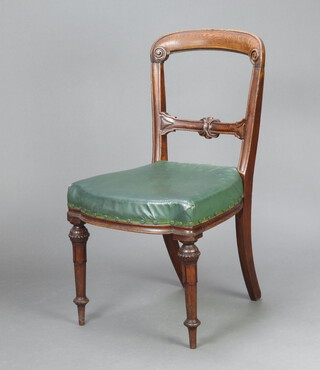 James Winter & Sons of 101 Wardour Street, Soho, London, an oak spoon back dining chair with carved mid rail and overstuffed seat, raised on turned and fluted supports 87cm h x 47cm w x 45cm d (seat 30cm x 34cm) 