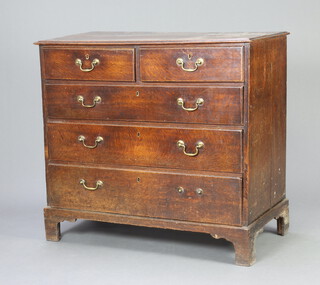 An 18th Century oak chest of 2 short and 3 long drawers with brass swan neck drop handles, raised on bracket feet 100cm h x 110cm w x 52cm d 