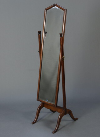 A 1930's rectangular bevelled plate cheval mirror contained in an oak swing frame 154cm h x 41cm w 