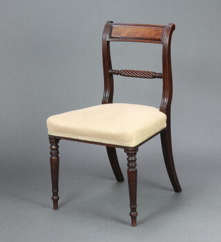 A Regency mahogany bar back dining chair with rope twist mid rail, overstuffed seat, raised on turned supports 83cm h x 47cm w x 42cm d 