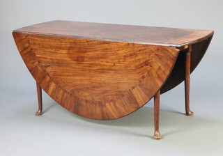 A George II oval crossbanded mahogany drop flap dining table raised on pad feet 73cm h x 161cm w x 62cm when closed x 192cm when open  