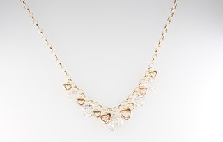 A 9ct yellow gold necklace with 2 colour heart drops, 1 marked 14k, gross weight 10 grams 