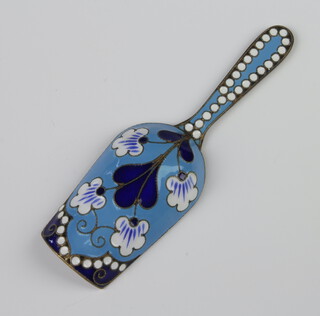 A Russian silver gilt and enamel caddy spoon decorated with flowers, 25.8 grams, 9cm 