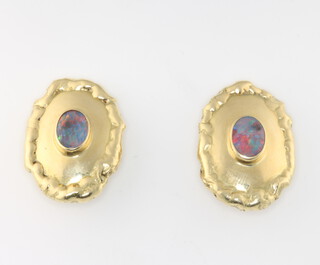 A pair of 18ct yellow gold oval opal ear clips (for pierced ears) 11.4 grams, 24mm 