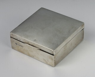 A silver square cigarette box 8cm x 8cm Birmingham 1942 