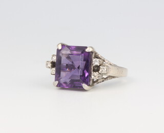 A white metal amethyst and diamond ring, size K, the amethyst 10mm, 5.6 grams