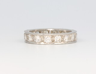 A white metal brilliant cut 16 diamond eternity ring approx. 1.12ct, size N, 6.6 grams