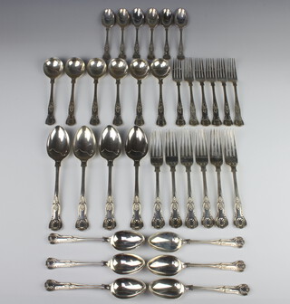 A canteen of silver Kings Pattern cutlery comprising 6 soup spoons, 6 dessert spoons, 4 table spoons, 6 tea spoons, 6 dessert forks, 6 dinner forks, London 1973/1974 2258 grams