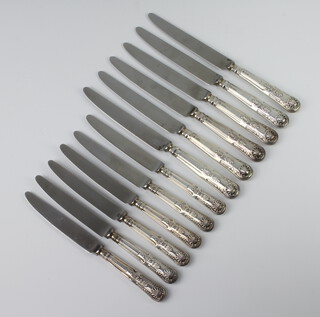 A set of 6 Kings Pattern silver handled dessert knives and 6 silver handled dinner knives, Sheffield 1973