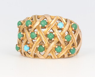 A 9ct yellow gold turquoise open basket weave ring containing 14 stones (some replaced) 7.5 grams, size Q 