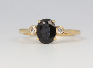An 18ct yellow gold sapphire and diamond ring 3.2 grams, size N 1/2