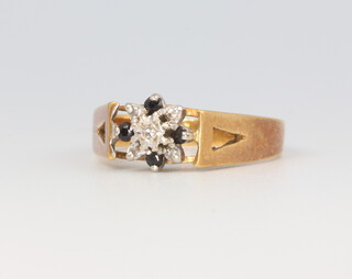 An 18ct yellow gold sapphire and diamond ring 3.6 grams, size O 