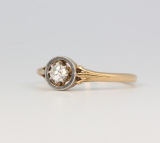 A yellow metal single stone diamond ring approx. 0.1ct, 2.6 grams, size L 1/2