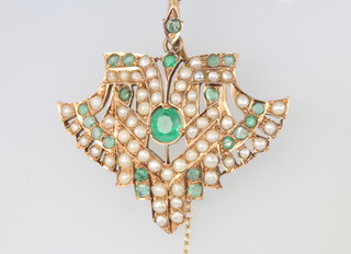 An Indian yellow metal emerald and pearl set pendant, 46mm, 11.6 grams 