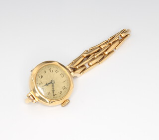 A lady's 18ct yellow gold wristwatch on a ditto expanding bracelet, gross weight 16 grams 