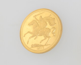 A 1977 five pound proof Isle of Man gold coin 40.2 grams 