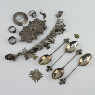 A silver charm bracelet, a ditto buckle and minor items, weighable silver 148 grams 