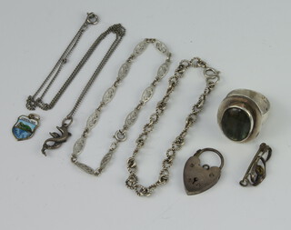 A silver dress ring and minor silver jewellery 
