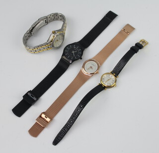 A lady's gilt cased Skagen wristwatch, a black ditto, a Pierre Cardin and 1 other watch 
