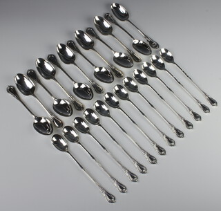 Twelve silver plated lily pattern dessert spoons and 12 ditto sundae spoons