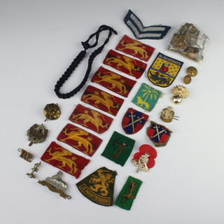 A quantity of Second World War and later metal and cloth Army badges