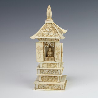 An early 20th Century carved ivory and bone shrine 20cm high 