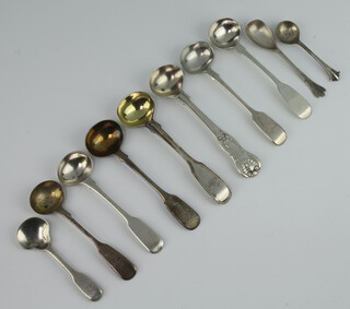A Victorian silver mustard spoon London 1865 and 9 other mixed spoons, 123 grams 
