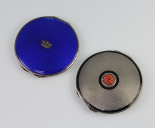 A silver and guilloche circular compact Birmingham 1933 (bruised) and a silver and enamel carved coral ditto  