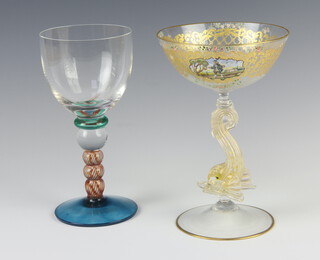 A 19th Century Italian glass with gilt scroll decoration and a panel painted a gentleman, raised on a dolphin stem, 18cm together with a coloured goblet, 17cm