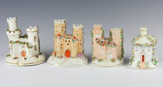 A Victorian Staffordshire Cottage with detachable lid and applied flowers, 10cm h, a two turreted castle, 10cm, another 12cm and another 13cm