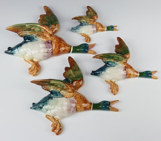 A set of four Beswick duck wall plaques, no.s 596/1, 596/2, 596/3 and 596/4