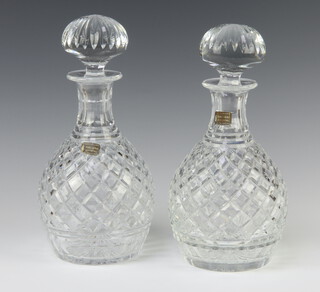 A pair of Whitefriars hobnail cut mallet shaped decanters with mushroom stoppers 25cm
