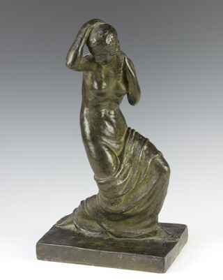 A classical style pottery figure of a semi-clad lady raised on a rectangular base 36cm 