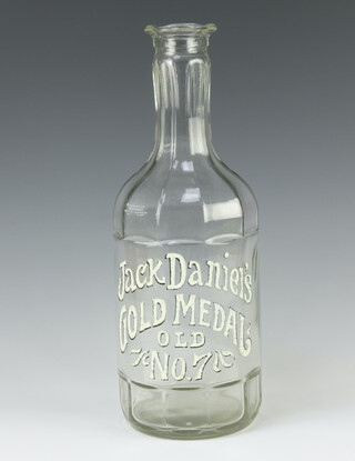 A moulded clear class Jack Daniels Gold Medal Old No.7 spirit bottle 32cm  