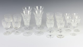 A set of 4 Stuart Crystal champagne flutes (1 chipped), 6 sherry glasses decorated with flowers, 4 small wines and 5 cordial glasses 
