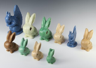 A Sylvac blue seated squirrel 22cm, a ditto 13cm, ditto green bunny 17cm, 2 others 10cm and 7cm, a pale tan bunny 18cm, 2 ditto 13cm, another 11cm and a dark brown ditto 12cm  