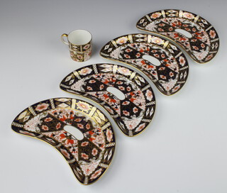 Four Royal Crown Derby Imari pattern hors d'oeuvres plates 23cm together with a ditto coffee can 