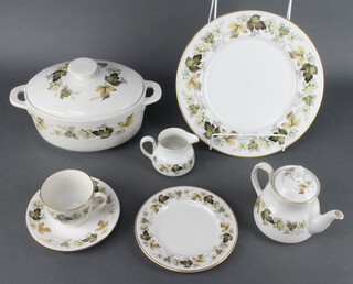 A Royal Doulton Larchmont pattern part tea and dinner service comprising 8 tea cups, 8 saucers, breakfast teapot, milk jug, 2 cream jugs, small jug, sugar bowl, 2 larger bowls, 8 small plates, 8 medium plates, 8 side plates, 8 dinner plates, 8 dessert bowls, 8 soup bowls, teapot and lid, 3 vegetable dishes and lids, 6 ramekins, 3 tier cake stand, 2 sauce boats and stands, 4 deep bowls, 2 small dishes, pie dish, a lidded bowl, 2 small oval meat plates, 2 large oval meat plates, 3 sandwich plates   