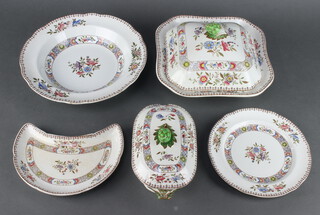 A Spode, retailed by Waring & Gillow, floral decorated dinner service comprising vegetable tureen and cover (cover chipped), sauce tureen and cover (tureen cracked), 6 hors d'oeuvres dishes, 4 octagonal graduated meat plates, 4 small plates, 5 side plates (2 chipped), 6 dinner plates and 6 soup bowls 