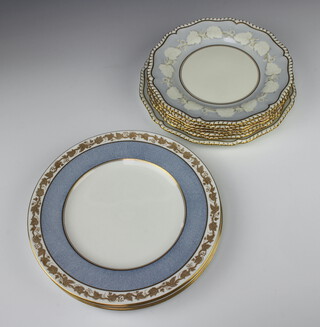 Six Royal Worcester dessert plates with vinous rims 23.5cm, a ditto dinner plate 26cm, five Wedgwood dinner plates with gilt vinous rims 27cm  